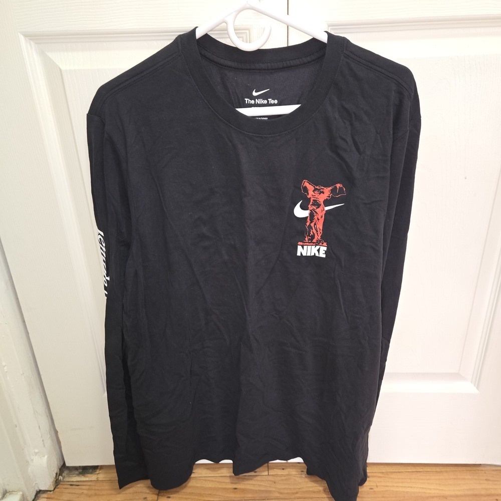 Nike Men's Black Long Sleeve Tee with Red Graphic